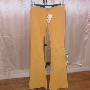 Flare tight fitting yellow jeans